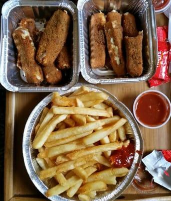 Fried Mozzarella Sticks really good along with good tasty marinara sauce and french fries with ketchup.