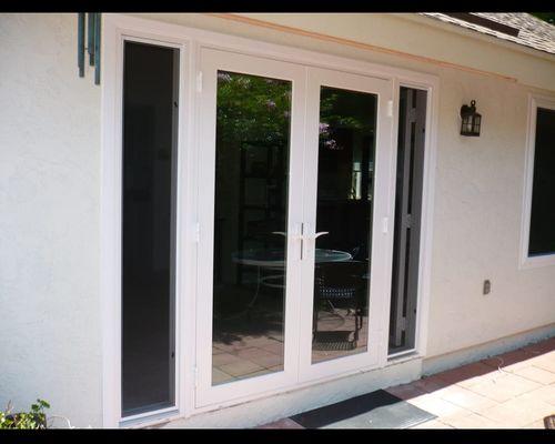 Retrofit French door with operational sidelights