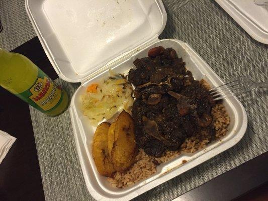 Oxtail, rice & peas, plantains and cabbage- SO good.