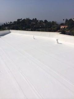 White solar reflective elastomeric roof upgrade coating