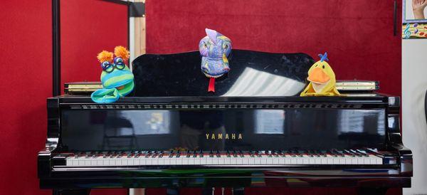 Our grand piano and friends ready to teach us all songs