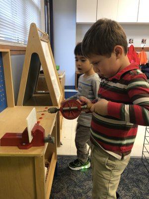 Daycroft primary student drilling into wood