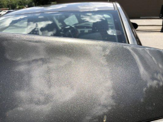 Mazda 3 trunk lid-Sharp Dent Repaired