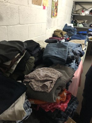 Back clothing room. The sizes are mixed together but I saw some great treasures in there. He had a large amount of plus sized items too!