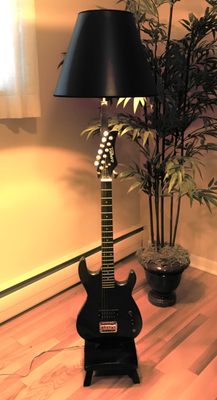 Custom floor lamp. Guitar can be removed to play.