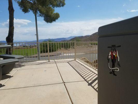 The Terrible Herbst mascot and view of Lake Mead. There are picnic tables here.