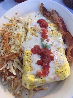 Western omelette topped with queso and salsa. SUPER YUM!