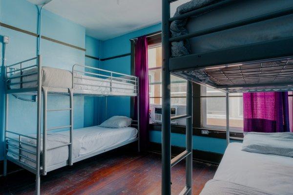 4 beds mixed dorm with air conditioning.