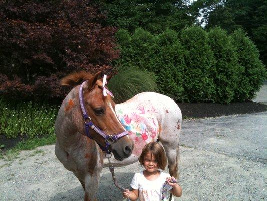 Finger painting ponies at camp