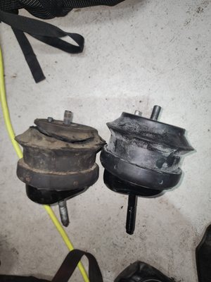 Bad motor mount on the left and a new mount on the right.