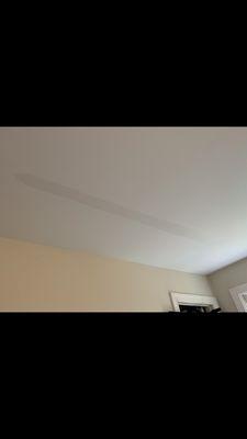 Ceiling water damage after roof repair.