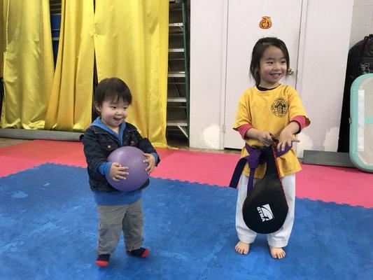 3 years old purple belt with her 2 years old brother