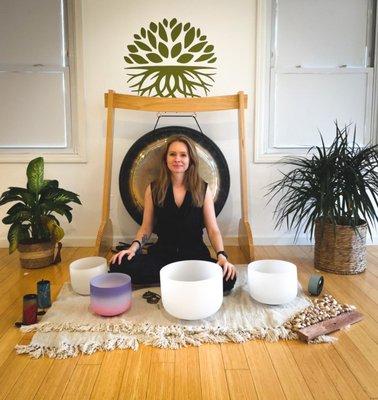 Monika plays her crystal bowls and gong during her Awaken class on Thursdays at 11:00am