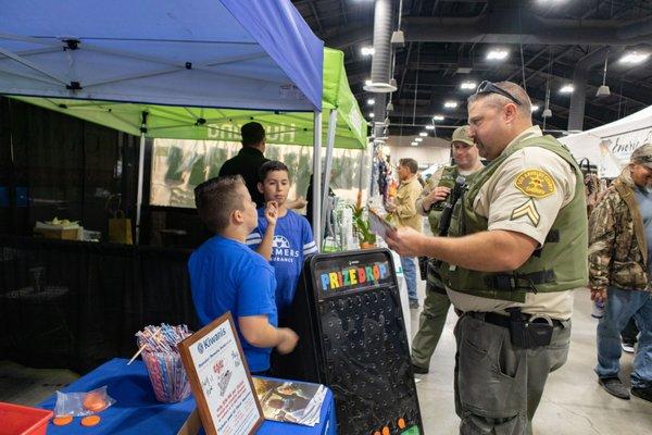 The Ortiz boys handing out valuable information for pet owners.