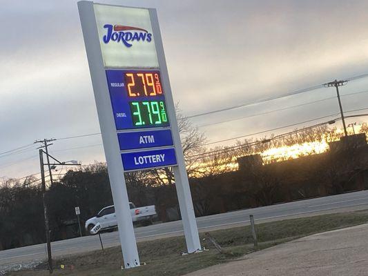 fuel prices on sign in front of store (they sell both gasoline and diesel fuel)