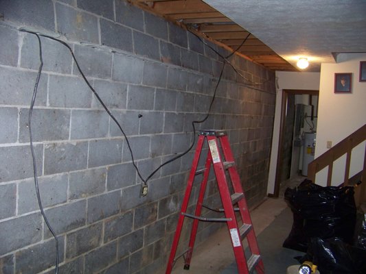 Basement wall caving in; in need of foundation repair soon