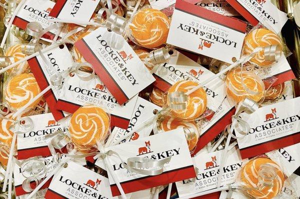 Suckers and business cards for Locke and Key Associates