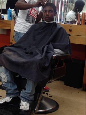 My son getting a fresh cut.