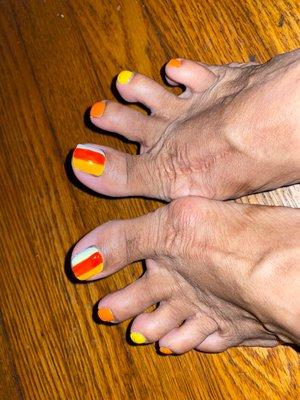 Excuse my ashy feet. My Halloween theme is candy corn. The pedicure was delightful. Ask for Linda