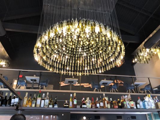 Chandelier is created from bottles.