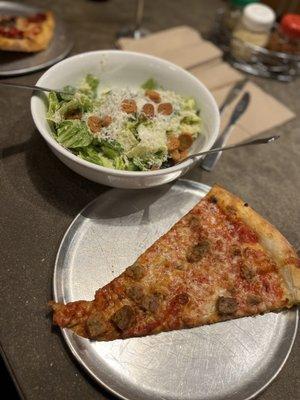 Caesar salad and meat pizza