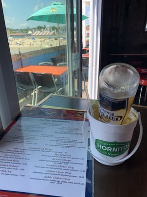 Coronarita and menu on the pier