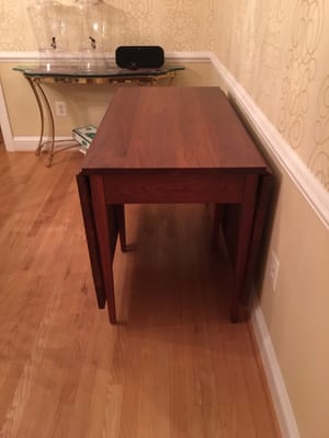 After picture of my Walnut wood drop leaf dining room table that my great grandfather  and grandfather made together in 1950.