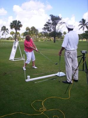 Kevin working with JoAnne Carner