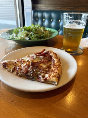 Meat lovers slice and chicken Caesar salad