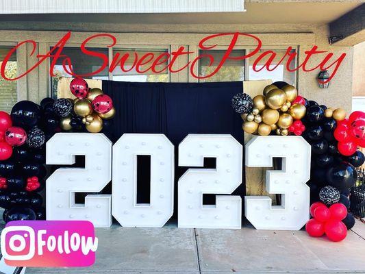 Marquee numbers, graduation balloons