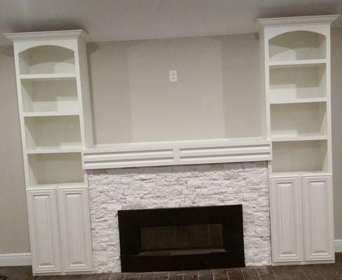 Fireplace with bookcase ends