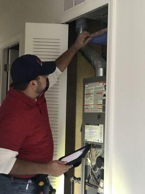 One of our inspectors, checking the aging and condition of the furnace.