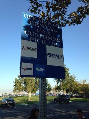 The shuttle stop at the main rental car area