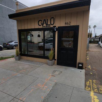 Galu Cafe All new doors and paint. Used to be an old barber shop.