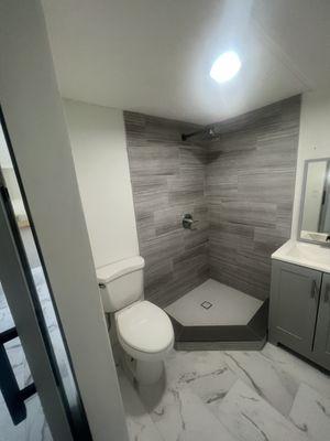 Bathroom shower remodeling, Tile Installation, floor and door