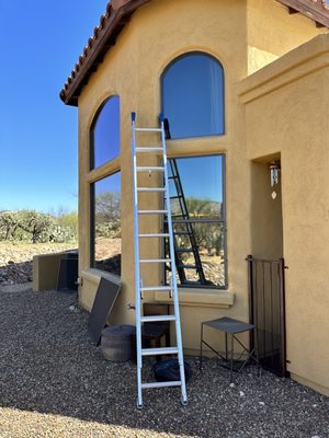 Two Guys and a Sponge cleaning windows