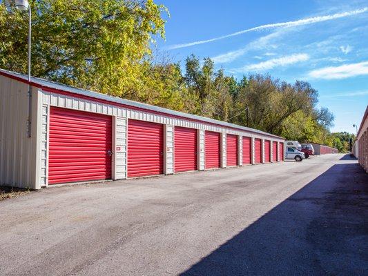 Rows of drive up storage units available for rent.