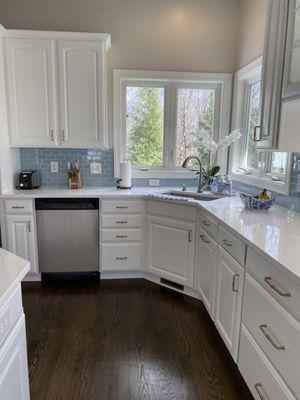 After picture GWF refinished floors, new counters, painted cabinets, new backsplash