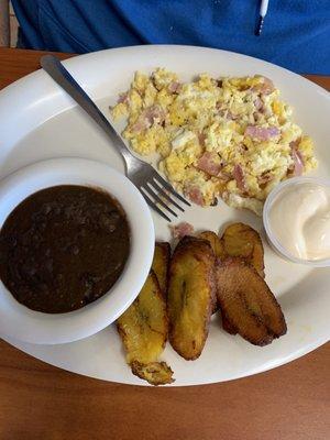 Eggs with ham, beans, plantains, and crema