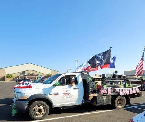 Michael in roadside service truck at the Hamlin homecoming parade.