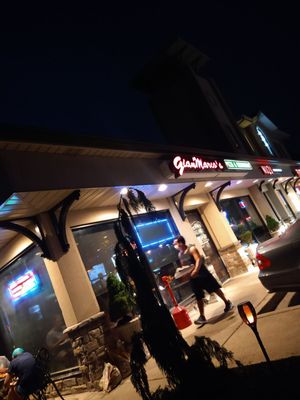 Outside seating of the restaurant at night