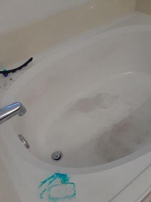 before cleaning tub