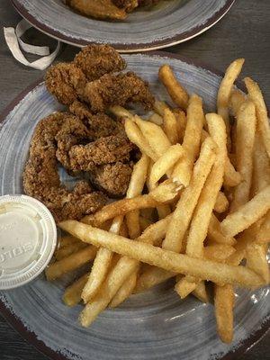 Chicken fingers and fries.