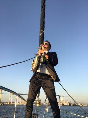 I played a proposal on a yacht, in my tux