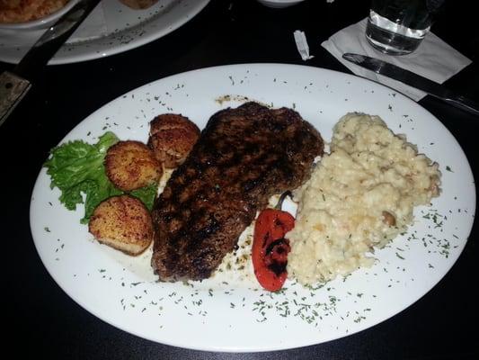 Amazing special of the day New York Strip black and scallop and mushroom risotto delicious.