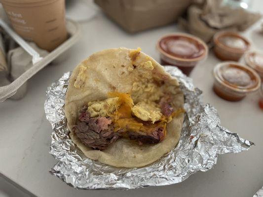 Brisket, egg and cheese taco