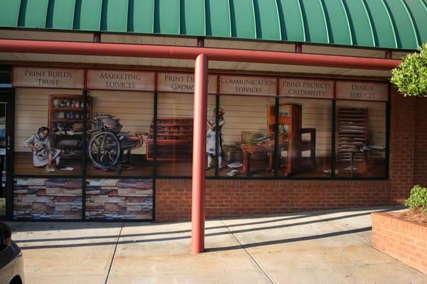 Our store front graphics gives the feel and look of a previous era print replica