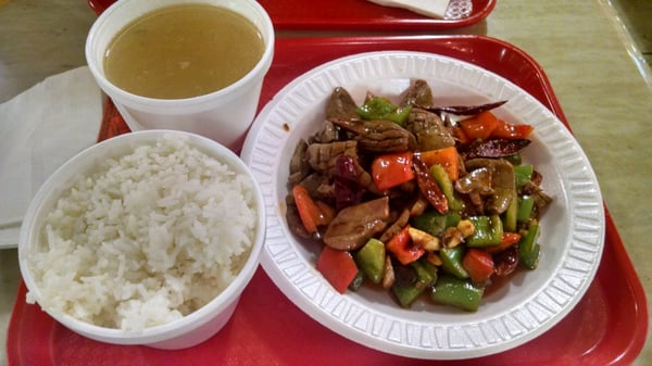 Pig kidney on rice with complementary soup.