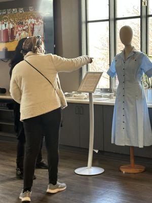 Reconstructed 1953 British Red Cross uniform designed by Norman Hartnell from the museum's archives