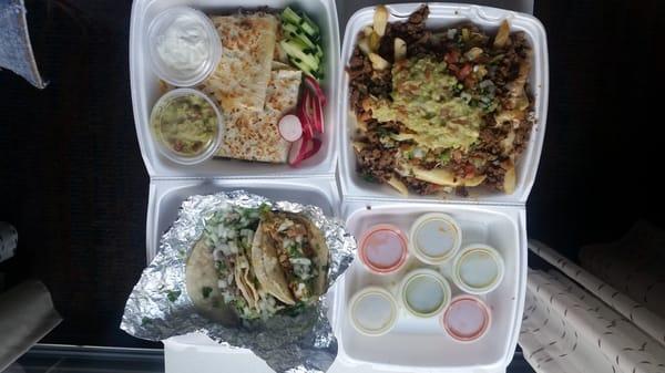 Beef quesadilla,  carne asada fries and street tacos (cow tounge, chicken and beef).